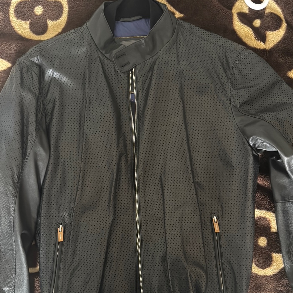 Black Bomber Jacket with Stand-Up Collar and Sleek Design